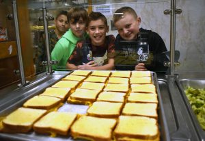 students with grilled cheese sandwiches