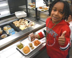 student on cafeteria line